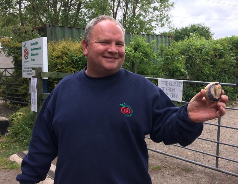 Ian by the gate at NEET garden centre. NEET logo and holding a pebble
NEET Bradford Shipley
Adults with Learning Disabilities
Day Service
Garden Centre
